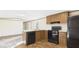 A modern kitchen features wood cabinets, sleek appliances, and ample counter space at 1086 Arrowhead Rd, Saint Stephen, SC 29479