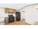 A modern kitchen features wood cabinets, sleek appliances, and ample counter space at 1086 Arrowhead Rd, Saint Stephen, SC 29479