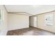 Bright and airy living room with hardwood floors, natural light, and neutral paint at 1086 Arrowhead Rd, Saint Stephen, SC 29479