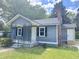 Attractive single-story home offering a tidy front lawn, freshly painted exterior, and inviting front porch at 109 Alexander St, Walterboro, SC 29488