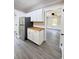 Modern kitchen offering stainless steel refrigerator, stylish butcher block countertops, and ample cabinet space at 109 Alexander St, Walterboro, SC 29488