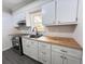 Well-appointed kitchen featuring stainless steel appliances, butcher block countertops, and bright natural light at 109 Alexander St, Walterboro, SC 29488