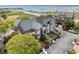 Beautiful aerial view of a residential community with waterfront views and lush landscaping at 11 Harleston Pl, Charleston, SC 29401