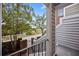 Inviting front entrance with brick accents, stairs, and wrought iron railings at 11 Harleston Pl, Charleston, SC 29401