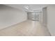 Finished room with tile floors, neutral paint, and doors to the outside at 11 Harleston Pl, Charleston, SC 29401