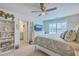 Airy bedroom with coastal decor, a ceiling fan, and lots of natural light coming from the window at 110 Angelica Ave, Summerville, SC 29483