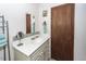 Well-lit bathroom features a vanity with a mirror and ample storage space at 110 Wallace Rd, Goose Creek, SC 29445