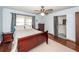 Serene bedroom features wood floors, a ceiling fan, and ensuite bathroom access at 110 Wallace Rd, Goose Creek, SC 29445