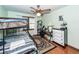 Cozy bedroom features a bunk bed, desk, and ceiling fan for added comfort at 110 Wallace Rd, Goose Creek, SC 29445