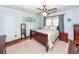 Inviting bedroom is complete with wood floors, a ceiling fan, and ample natural light at 110 Wallace Rd, Goose Creek, SC 29445
