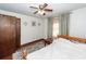 Comfortable bedroom boasts a ceiling fan, wood floors, and a floral-patterned area rug at 110 Wallace Rd, Goose Creek, SC 29445