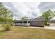 Beautiful brick house with long porch and detached garage at 110 Wallace Rd, Goose Creek, SC 29445