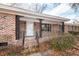 This cozy porch features a decorative metal railing and access to the front door at 110 Wallace Rd, Goose Creek, SC 29445