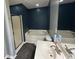 Well-lit bathroom featuring a shower and separate soaking tub at 1119 Moss Grove Dr, Moncks Corner, SC 29461