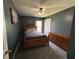 Cozy bedroom featuring a ceiling fan, carpeted floors, and an ample dresser at 1119 Moss Grove Dr, Moncks Corner, SC 29461