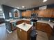 This spacious kitchen features stainless appliances, a center island, and ample counter space at 1119 Moss Grove Dr, Moncks Corner, SC 29461