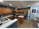 This spacious kitchen features stainless appliances, a center island, and ample cabinet space at 1119 Moss Grove Dr, Moncks Corner, SC 29461