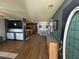 Open-concept living area seamlessly connecting to the kitchen and dining space at 1119 Moss Grove Dr, Moncks Corner, SC 29461