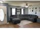 Spacious living room featuring a large sectional sofa and modern decor at 1119 Moss Grove Dr, Moncks Corner, SC 29461