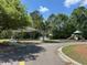 Community park featuring a picnic pavilion, playground, and walking paths at 1119 Moss Grove Dr, Moncks Corner, SC 29461