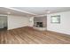 Basement featuring a brick fireplace, new flooring, and recessed lighting at 115 White Blvd, Summerville, SC 29483