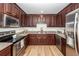 Well-equipped kitchen features stainless steel appliances and granite countertops at 115 White Blvd, Summerville, SC 29483