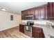 Modern kitchen with stainless steel appliances, granite counters, and ample cabinet space at 115 White Blvd, Summerville, SC 29483