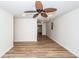 Spacious living room with new flooring, ample natural light, and ceiling fan at 115 White Blvd, Summerville, SC 29483