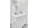Bright bathroom featuring a white vanity, a large mirror, and modern fixtures in a serene, neutral color palette at 116 Slater Lake Ln, Summerville, SC 29483