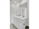 Bright bathroom featuring a double vanity, a large mirror and modern fixtures at 116 Slater Lake Ln, Summerville, SC 29483