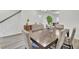 Elegant dining room with ample seating and sleek hardwood floors at 116 Slater Lake Ln, Summerville, SC 29483