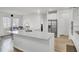 Bright kitchen featuring stainless steel appliances, island with sink, and hardwood floors at 116 Slater Lake Ln, Summerville, SC 29483