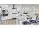 Modern kitchen with white cabinets, stainless steel appliances, and a kitchen island at 116 Slater Lake Ln, Summerville, SC 29483