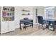 Bright and airy office space with natural light, sleek hardwood flooring, and stylish furnishings at 116 Slater Lake Ln, Summerville, SC 29483