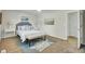 Bedroom featuring coastal artwork, side tables, and a cozy bench at 116 Trestlewood Dr, Summerville, SC 29486