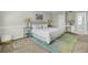 Serene bedroom with a patterned headboard, soft lighting, and a decorative rug at 116 Trestlewood Dr, Summerville, SC 29486