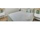 Inviting bedroom featuring coastal decor, soft bedding, and bedside tables with lamps, providing a cozy space at 116 Trestlewood Dr, Summerville, SC 29486
