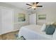 Bright bedroom with a ceiling fan, soft carpet, closet, and tasteful decorations, creating a relaxing retreat at 116 Trestlewood Dr, Summerville, SC 29486