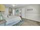 Bright bedroom with comfortable bed, soft decor, and access to an attached bathroom at 116 Trestlewood Dr, Summerville, SC 29486