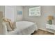 Inviting bedroom featuring neutral decor, soft bedding, and bedside tables with lamps, providing a cozy space at 116 Trestlewood Dr, Summerville, SC 29486