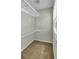 Empty closet with neutral walls, carpet, and a window at 116 Trestlewood Dr, Summerville, SC 29486