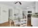 Charming dining area with white furnishings and beachy decorations near the kitchen at 116 Trestlewood Dr, Summerville, SC 29486
