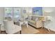 Cozy living room featuring a comfortable sofa, stylish decor, and ample natural light at 116 Trestlewood Dr, Summerville, SC 29486
