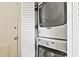 A laundry closet with stacked Maytag washer and dryer units for space-saving convenience at 1211 Eastwood Ave, Hanahan, SC 29410
