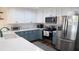 Well-appointed kitchen featuring stainless steel appliances and ample counter space for cooking at 126 Jungle Rd # 7B, Edisto Beach, SC 29438