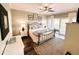 Serene main bedroom with a king bed, stylish decor, and access to a private balcony at 126 Jungle Rd # 7B, Edisto Beach, SC 29438
