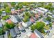 Real estate showcasing neighborhood streets lined with charming homes and lush greenery at 13 H St, Charleston, SC 29403