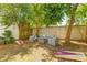 Inviting outdoor living space with lounge furniture, cornhole, and a cozy fire pit at 13 H St, Charleston, SC 29403