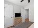 Bright bedroom featuring a ceiling fan, dresser, and neutral colors and tones at 13 H St, Charleston, SC 29403