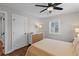 Bright bedroom featuring a ceiling fan, dresser, and a window with natural light at 13 H St, Charleston, SC 29403